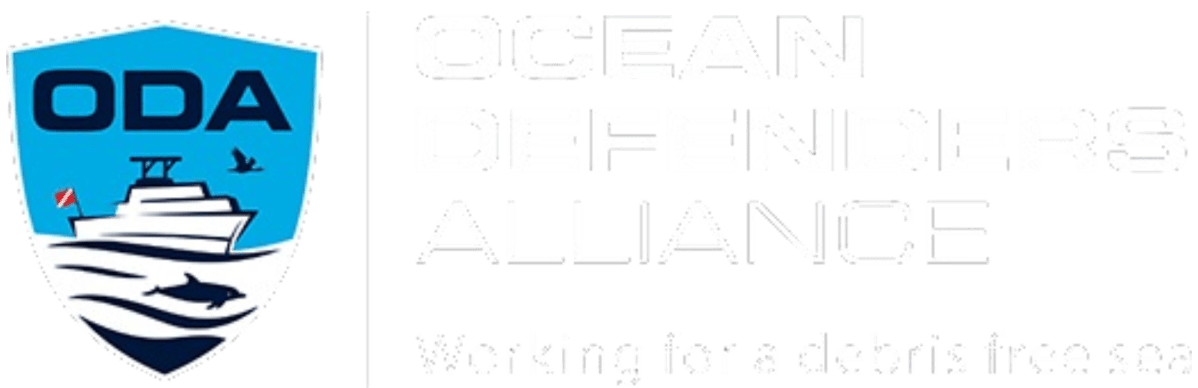 Ocean Defenders Alliance logo with a boat, bird, and shark illustration.
